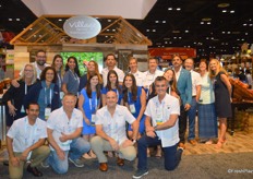 Happy Hour and all smiles in the Village Farms booth.